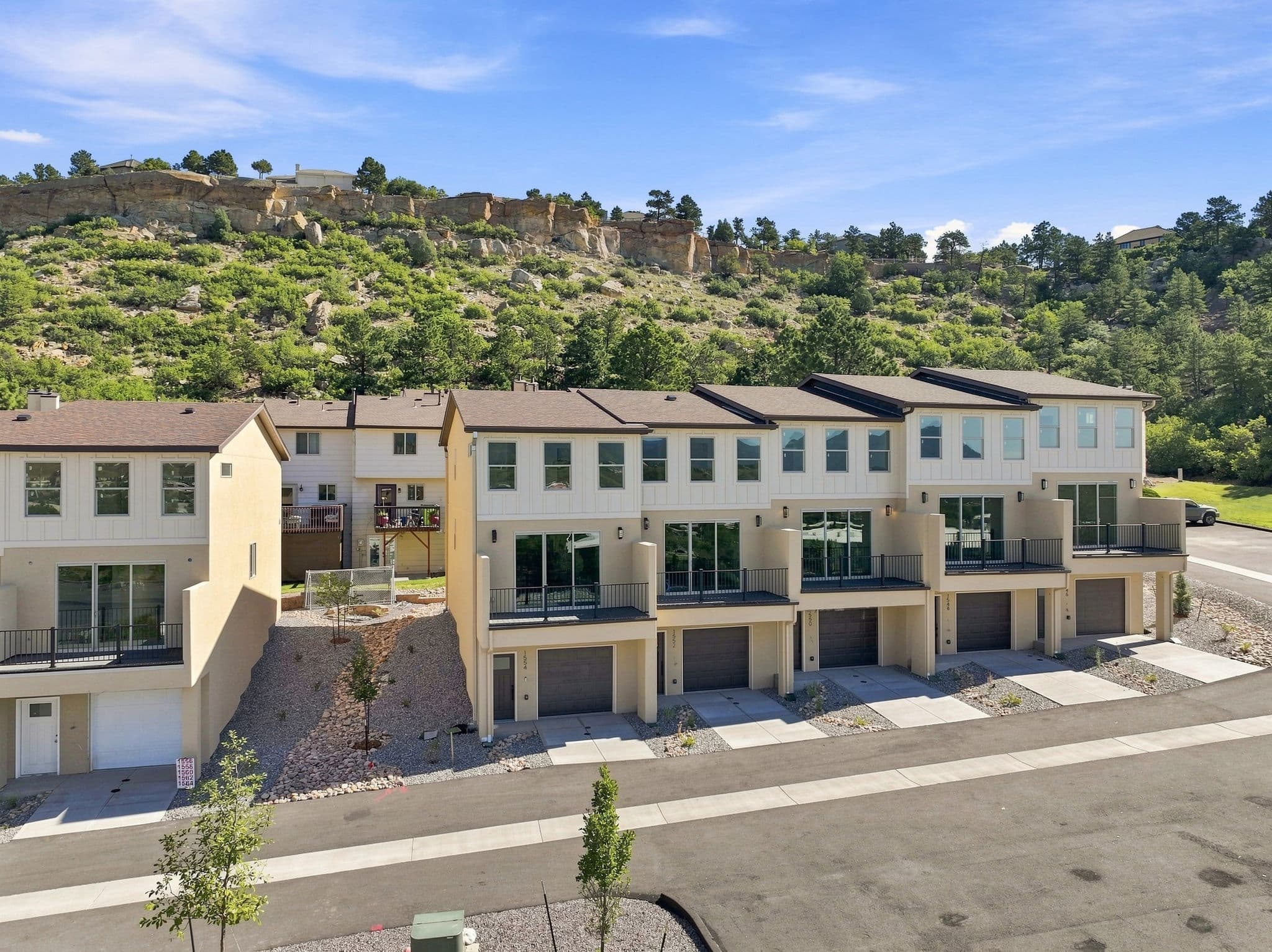 Indian Bluffs townhomes beneath the sandstone bluffs